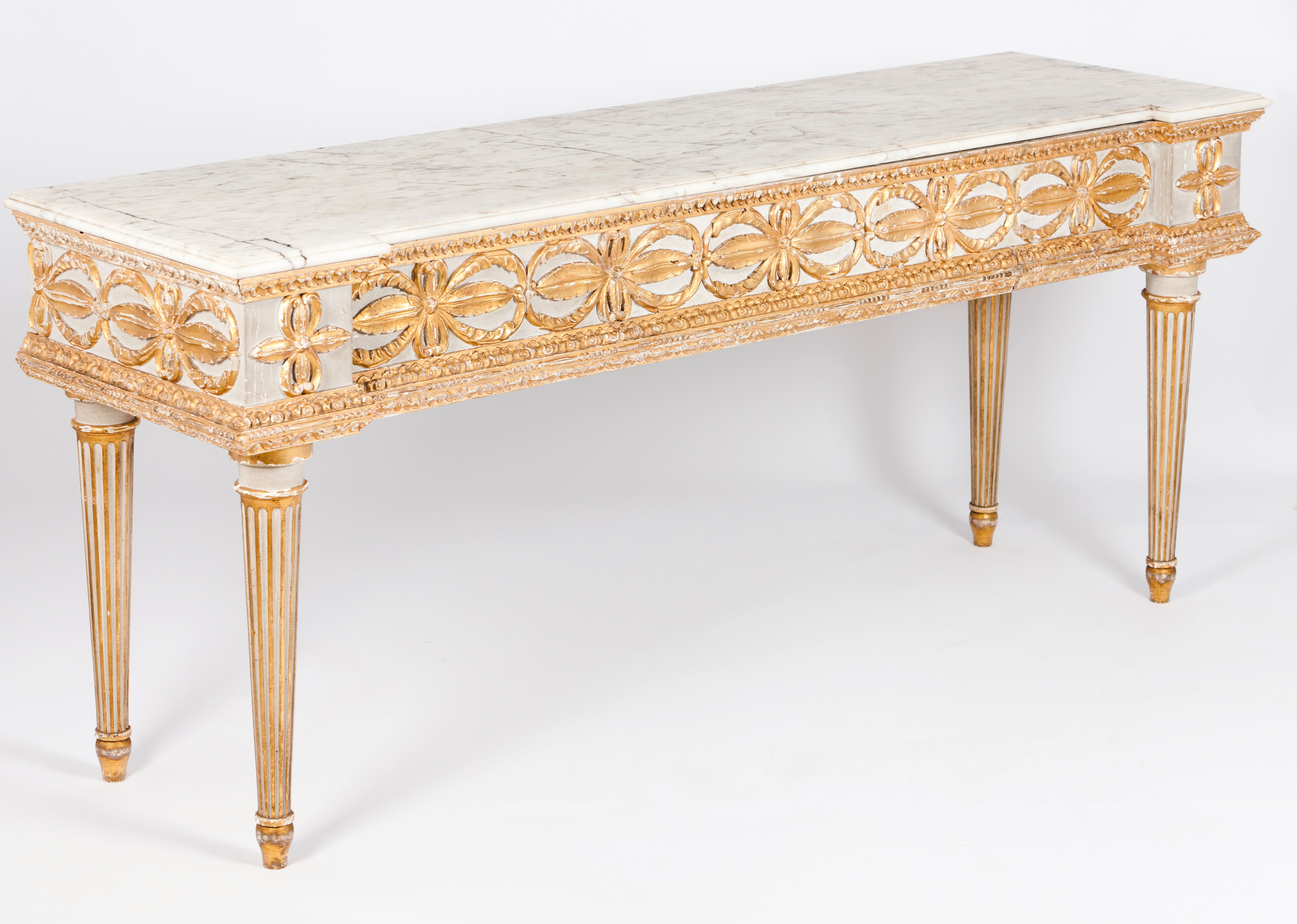 A pair of large credence tablesLacquered and gilt wood Carved and fluted decoration with foliage