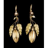 A pair of drop earringsGold Chiselled and gadrooned decoration replicating cocoa fruit and foliage