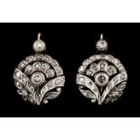 A pair of Romantic era earringsSilver and Portuguese gold Pierced floral and foliage decoration