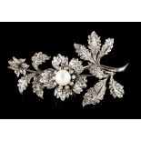 A tremblant broochPortuguese gold A flower and foliage branch set with one cultured pearl (9 mm) and