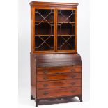 A bureau bookcaseMahogany of thornbush and jacaranda fileted decoration Four long drawers and