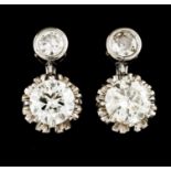 A pair of earringsWhite gold Set with 4 brilliant cut diamonds totalling (ca. 3.80ct) the two larger