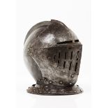 An closed helmetWrought iron Europe, 16th century (later upper and lower visors)30x25x31 cm