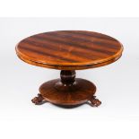 A Victorian breakfast tableRosewood veneered Faceted central shaft on a circular claw feet stand and