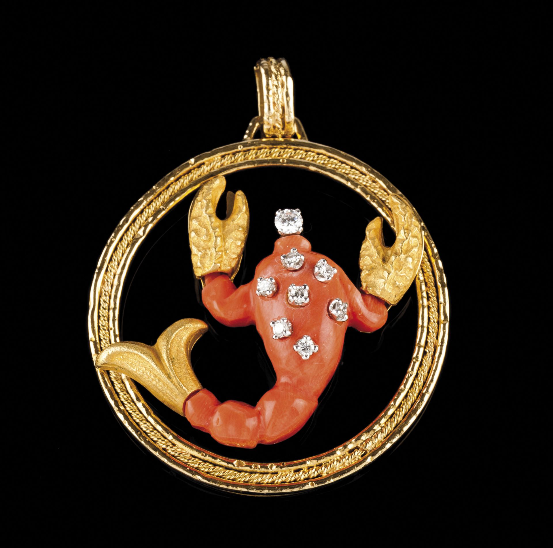 A "Scorpio" pendant18kt gold with hammered and chiselled decoration, carved coral and eight