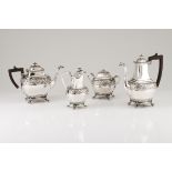A tea and coffee setPortuguese silver Low relief foliage band decoration, swan neck spouts with