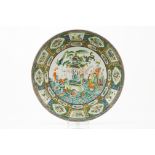 A large plateCanton porcelain Polychrome decoration with central landscape with the eight immortals,