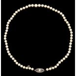 A cultured pearl necklaceGold clasp Oval shaped set with one pearl and 18 8/8 cut diamonds 6 to 9 mm