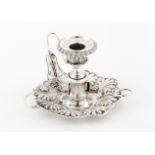 A chamberstick with snufferPortuguese silver Stand of raised shell decoration, tulip shaped