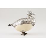A Luiz Ferreira duckSilver and ostrich egg Moulded, scalloped and chiselled sculpture of garnet eyes