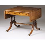 An English style sofa-tableSatinwood and burr-walnut band With four drawers Lyre Feet with Casters