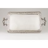 A large trayPortuguese silver Rectangular shaped of rounded corners Profuse raised decoration to lip