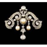 A romantic era broochGold and platinum Foliage, volutes and scroll decoration set with frieze of