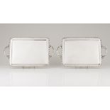 A pair of traysSpanish silver Plain rectangular shaped of wide gadroons Protruding handles of