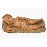 A reclining Child JesusTerracotta sculpture Polychrome decoration Portugal, 18th / 19th century (