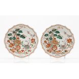 A pair of scalloped platesChinese export porcelain Polychrome and gilt decoration of flowers and