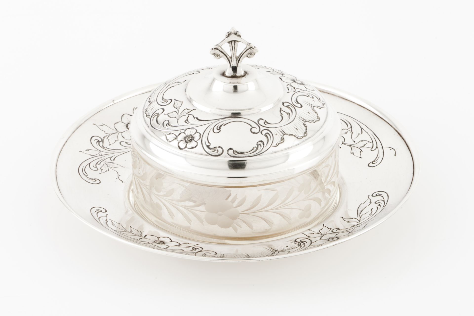 A butter dishPortuguese silver Engraved base and cover of foliage border Engraved glass dish Boat