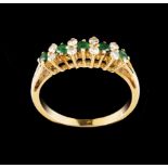 A memory ringPortuguese gold Set with 4 small round cut emeralds and 8 8/8 cut diamonds Deer