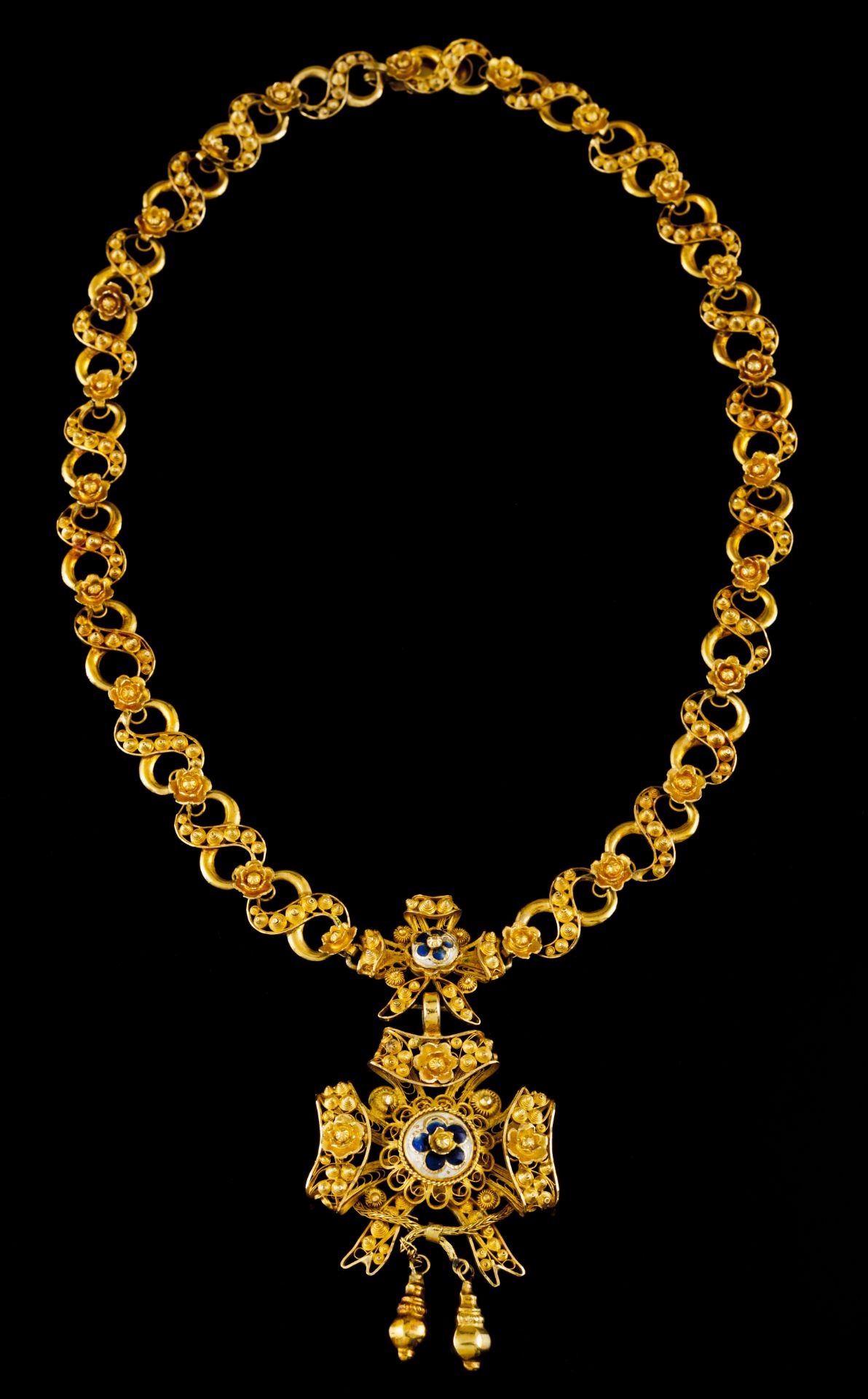 A necklace and pendantPortuguese traditional gold, 19th century Filigree bows, grained, scrolls