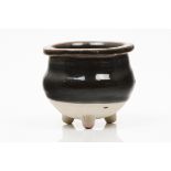 A tripod incense burnerCizhou ceramics Black glaze decoration Song dynasty, 12th / 13th