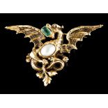 A broochGold Dragon set with one emerald cut emerald (ca. 7x5mm) and a baroque half pearl Europe,