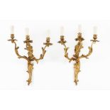 A pair of Louis XV style three branch wall sconcesGilt bronze Moulded decoration 20th centuryHeight: