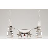A pair of large obelisks and bowlRock crystal and Italian silver Square bases on four bun feet
