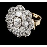 A ringGold and silver, 19th / 20th century Flower top set with one cushion cut diamond (ca. 1.