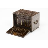 A small cabinetRosewood of foliage ivory inlays Drop front and six inner drawers simulating nine