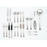 A twelve cover cutlery setSilvered metal Scalloped frieze decoration to handles Soup spoons, meat