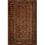 A Bukhara rug, IranWool and cotton Geometric pattern in brown, blue and beige shades168x105 cm