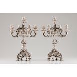 A pair of five branch candelabraPortuguese silver Profuse D.João V style, raised and engraved