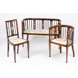 An Edwardian two seater settee and two chairsMahogany Satinwood inlaid filleting Pierced back splats