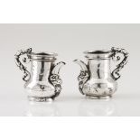 A pair of Holy Oils cruetsSilver, 17th century "S" shaped handle of Baroque decoration Unmarked in