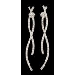 A pair of earringsPortuguese gold Crossed elements set with 90 brilliant cut diamonds (ca. 0.90ct)