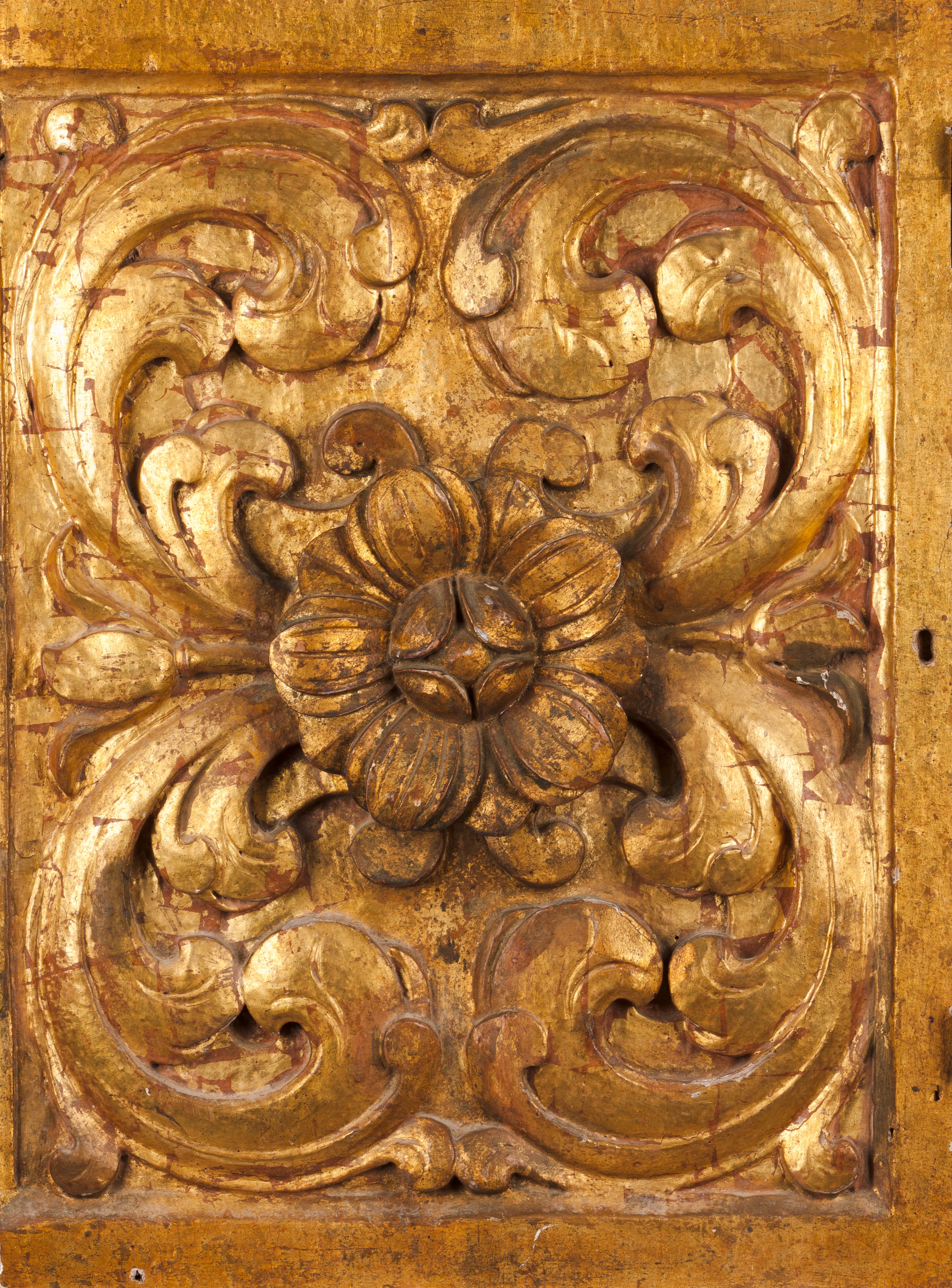 A carved wooden fragmentCarved and gilt wood of foliage motifs decoration Portugal, 18th century (