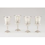 A set of four drinking vesselsPortuguese silver Neo-Renaissance gadrooned and chiselled decoration