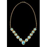 A necklace and braceletGold Oval articulated links grained mesh chain set with faux turquoises of