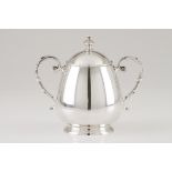 A sugar bowlPortuguese silver Plain pear shaped body of volute foliage decorated handles, on a