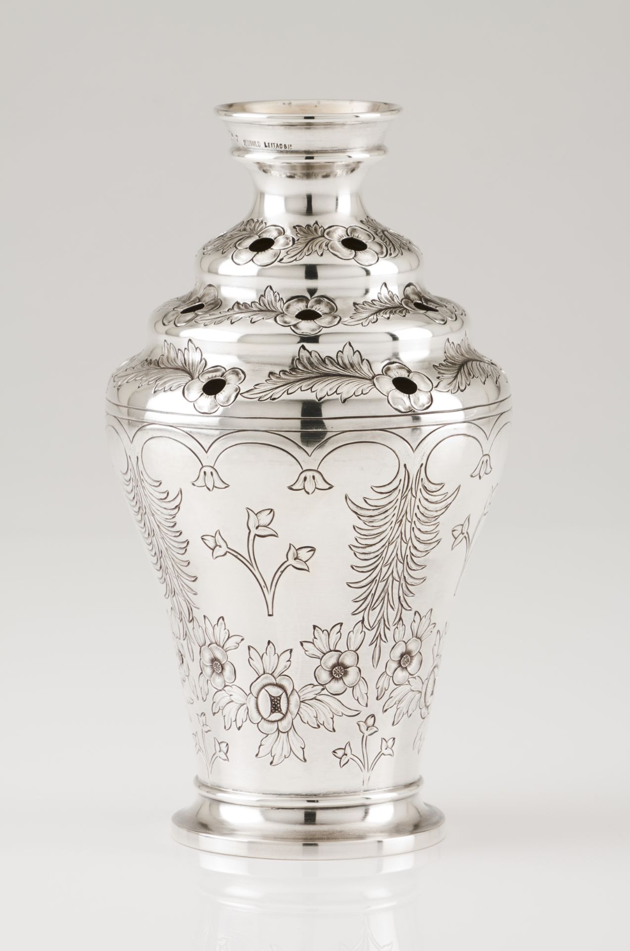 A vasePortuguese silver Fully engraved turned body of foliage motifs and various flower holding