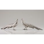 A pair of pheasantsSpanish silver Moulded, scalloped and chiselled sculptures Spanish assay marks
