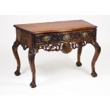 A D.João V style side tableChestnut Carved decoration of shells and foliage motifs One drawer