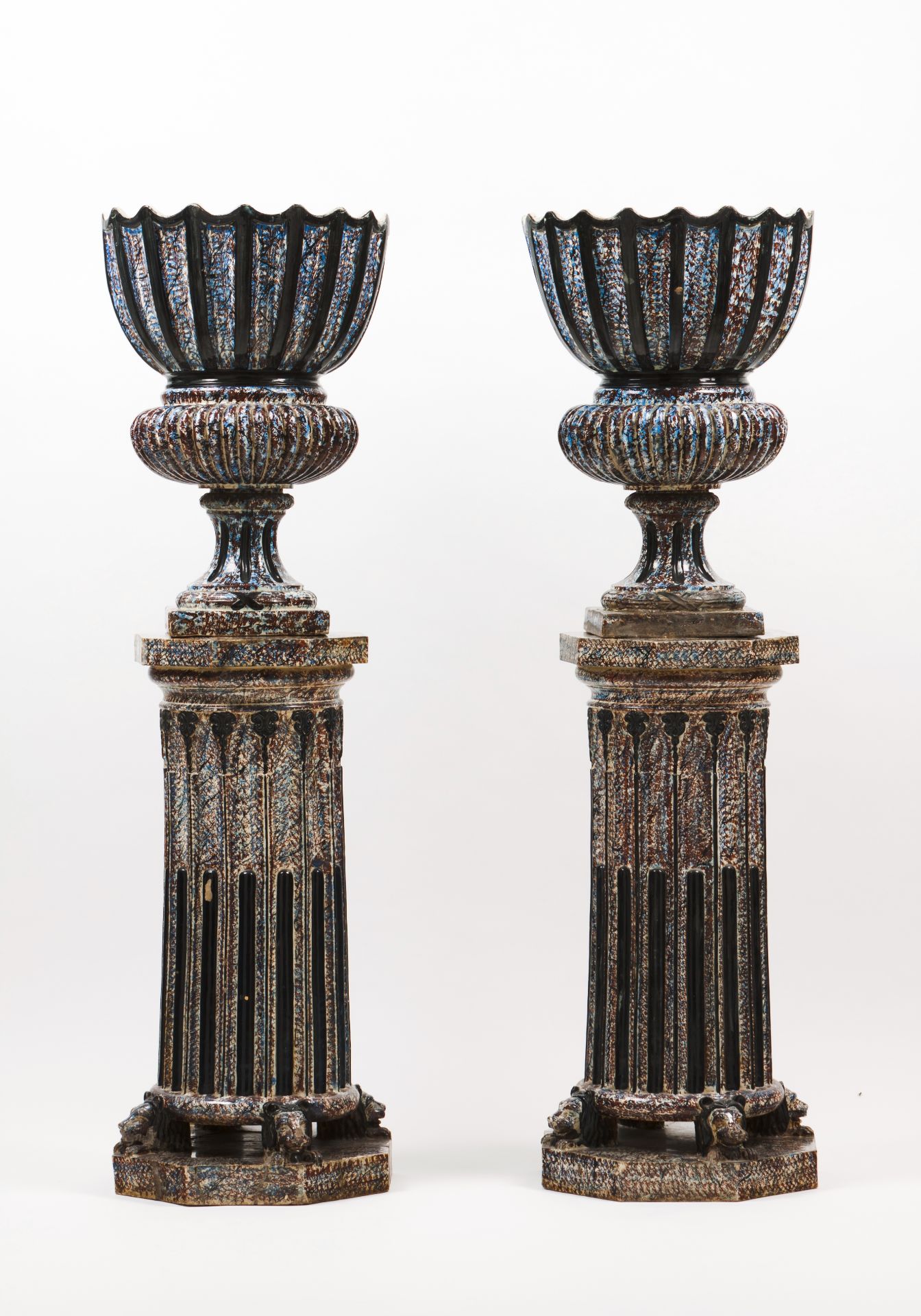 A pair of flower bowls with stands"Massarelos" faience Polychrome decoration Marked: "FABRICA DE