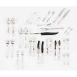 A twelve cover cutlery set Grooved decoration known as "caninhas" Soup spoons, meat knives and