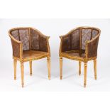 A pair of Louis XV style bergèresCarved and gilt wood Caned seats, backs and sides France, 19th