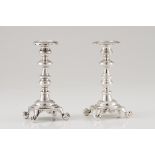 A pair of candle standsPortuguese silver, 19th century Turned shaft of geometric motifs band