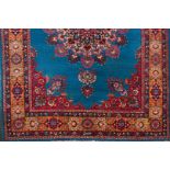 A Mashed rugWool and cotton Blue , bordeaux and orange of floral pattern and central