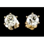 A pair of screw back earringsGold Set with two brilliant cut diamonds totalling (ca. 1.30ct)
