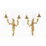 A set of four Louis XV style two branch wall sconcesGilt bronze Moulded decoration 20th