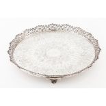 A salverPortuguese silver Engraved and chiselled centre of profuse foliage inspired decoration and